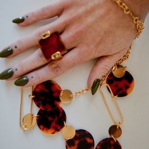 Collier long marbré